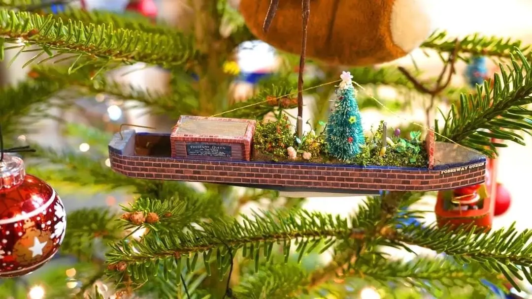 Canal-themed narrowboat ornament on a decorated Christmas tree at Lichfield Cathedral